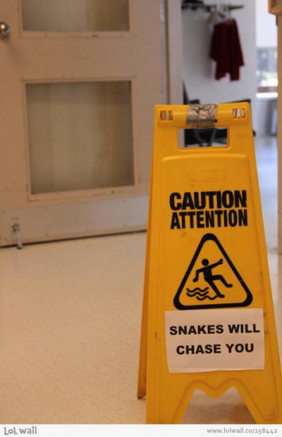 caution-snakes_258442-667x-662x1024.jpg