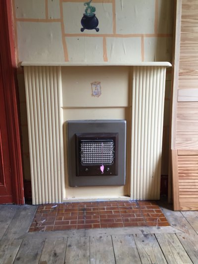 Spare room fireplace before.jpg